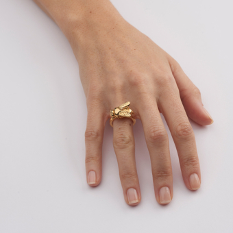 model wearing yellow gold bee ring